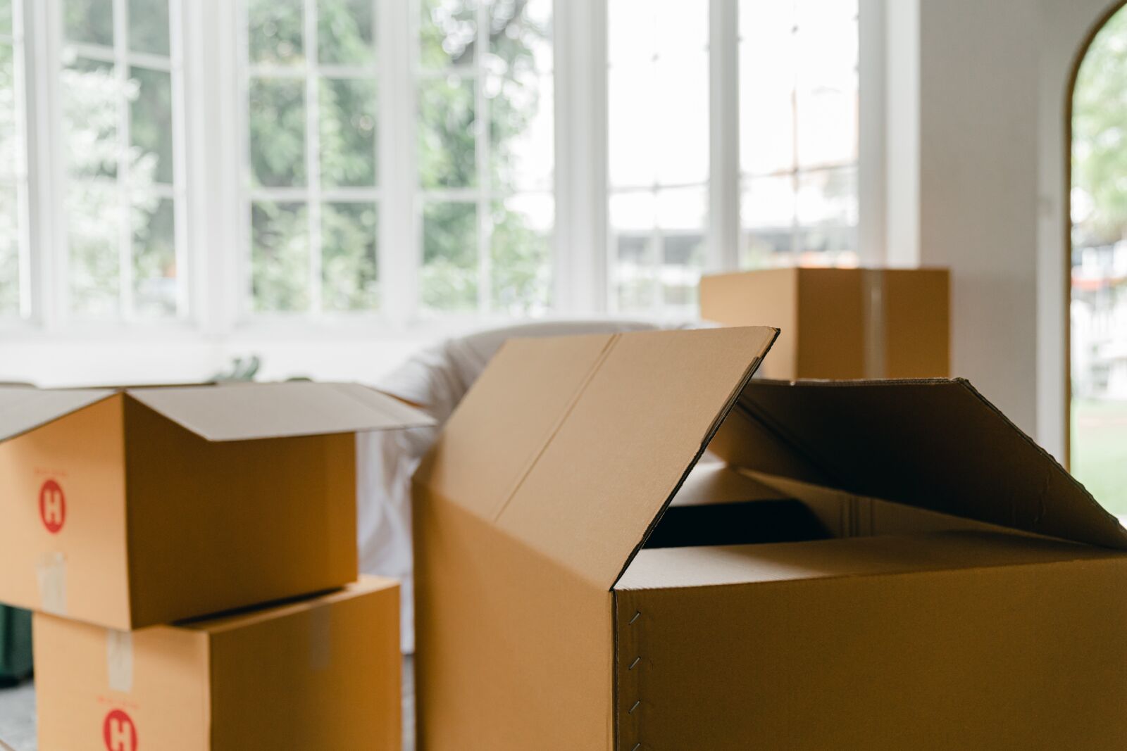 pexels-ketut-subiyanto-4246091 cardboard moving boxes