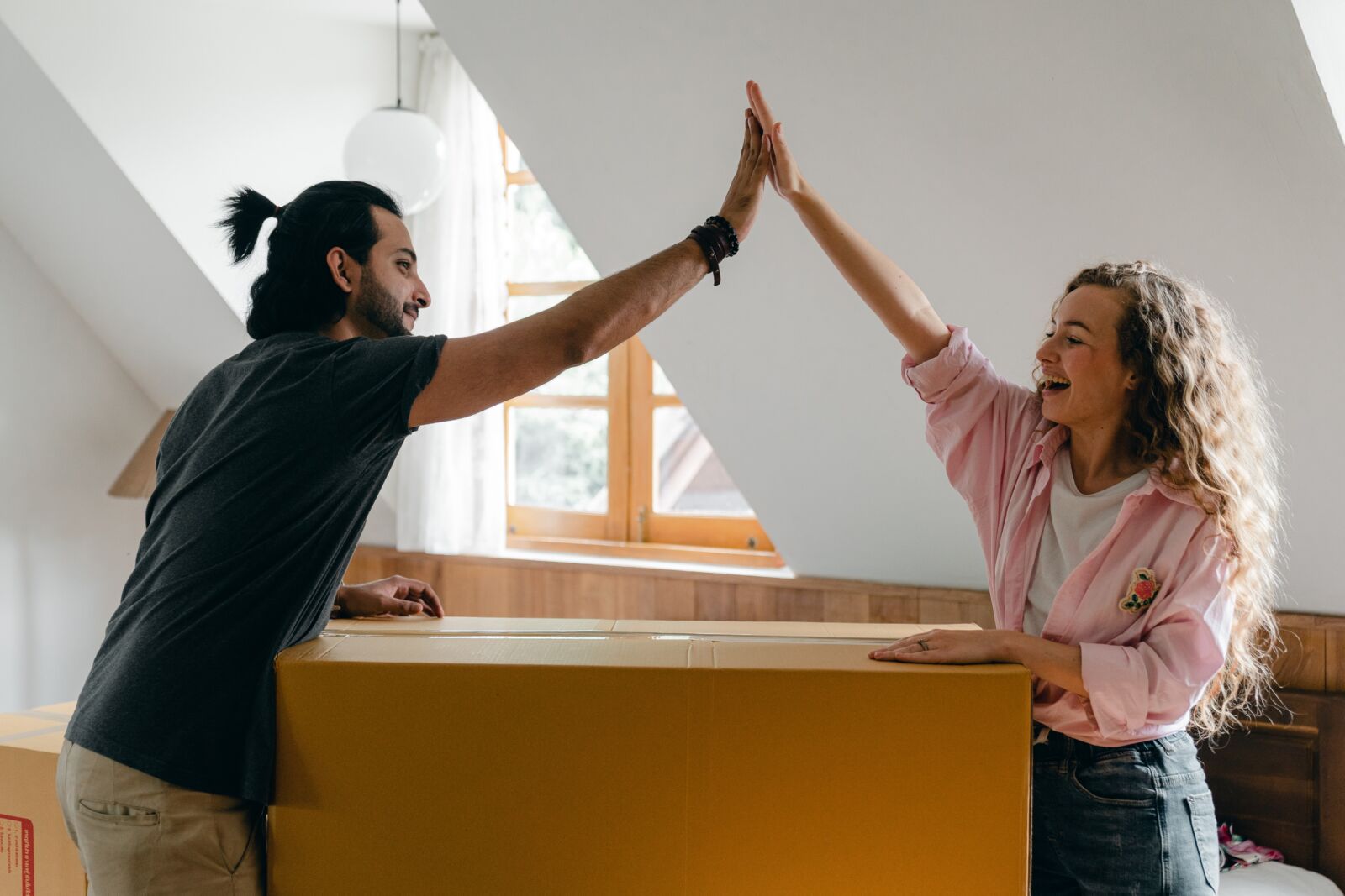 a couple high fiving