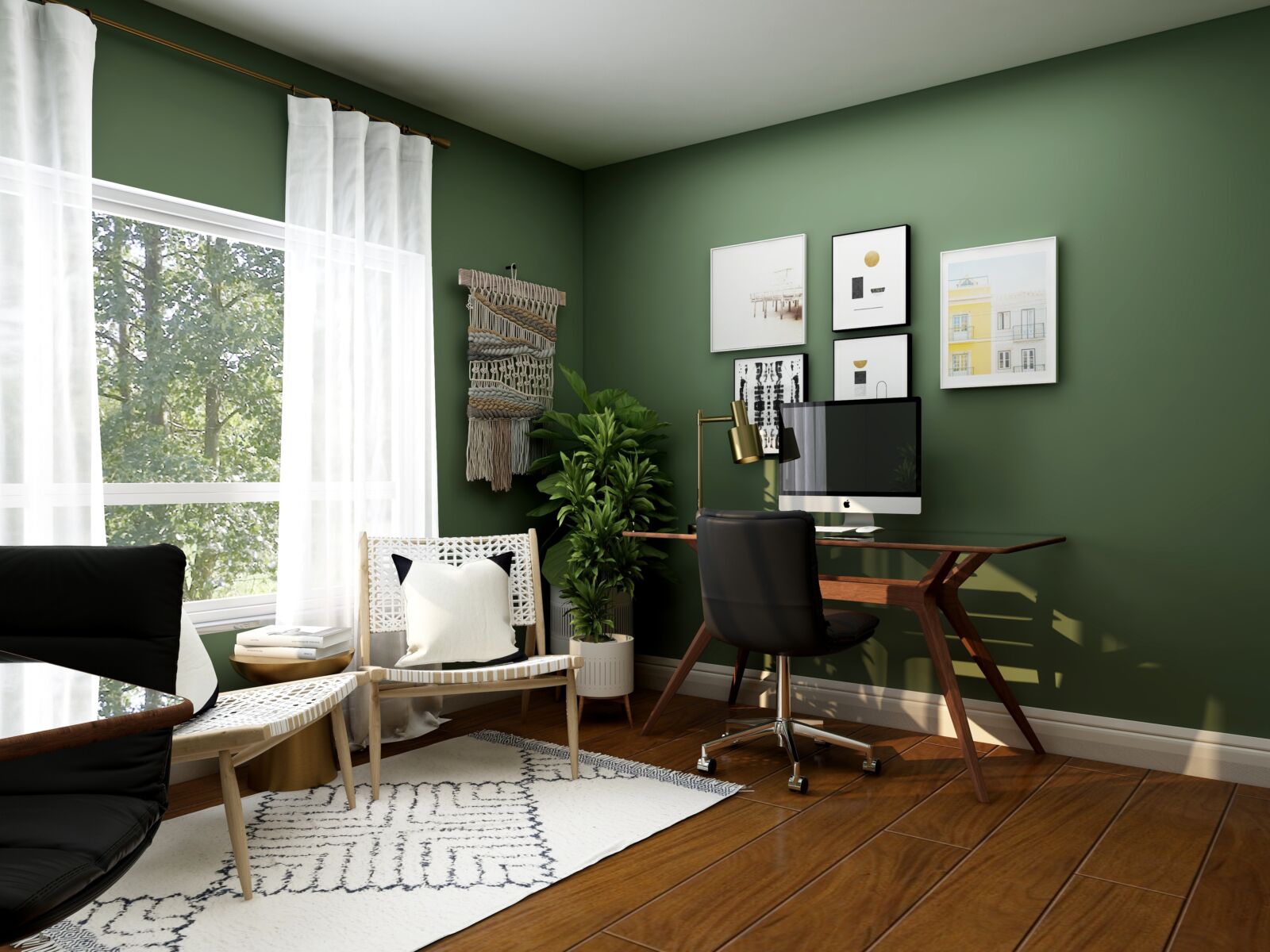 home office with green walls and dark wood furniture